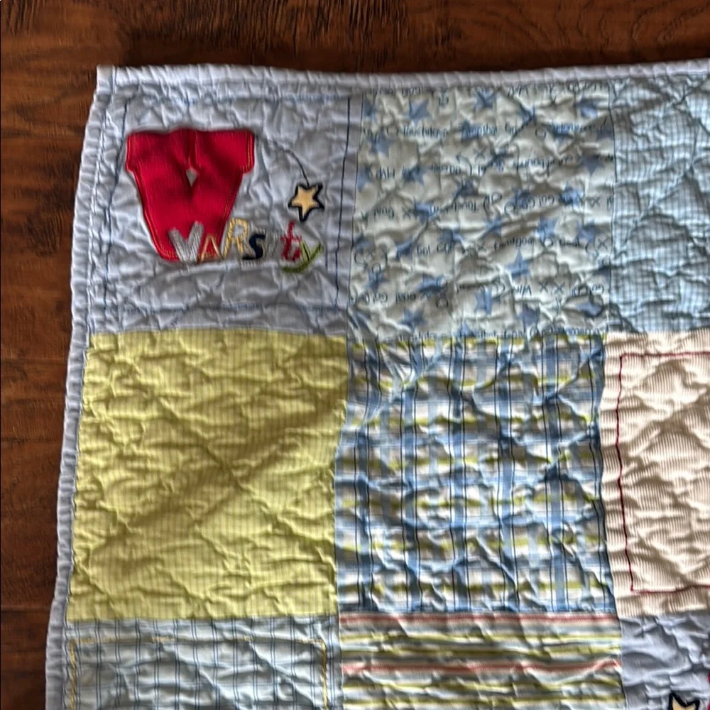 Varsity Baby Quilt with Red and Yellow Accents. Home quilted